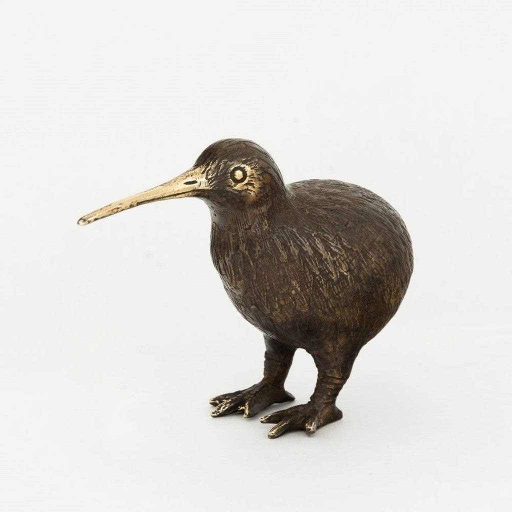 Small brass kiwi ornament on white
