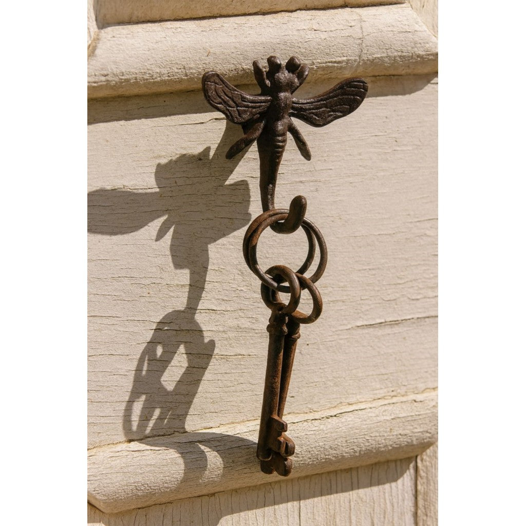 Cast iron bee hook holding a set of keys