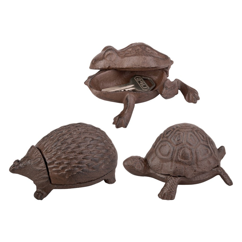 Cast iron turtle and hedgehog key keepers on white