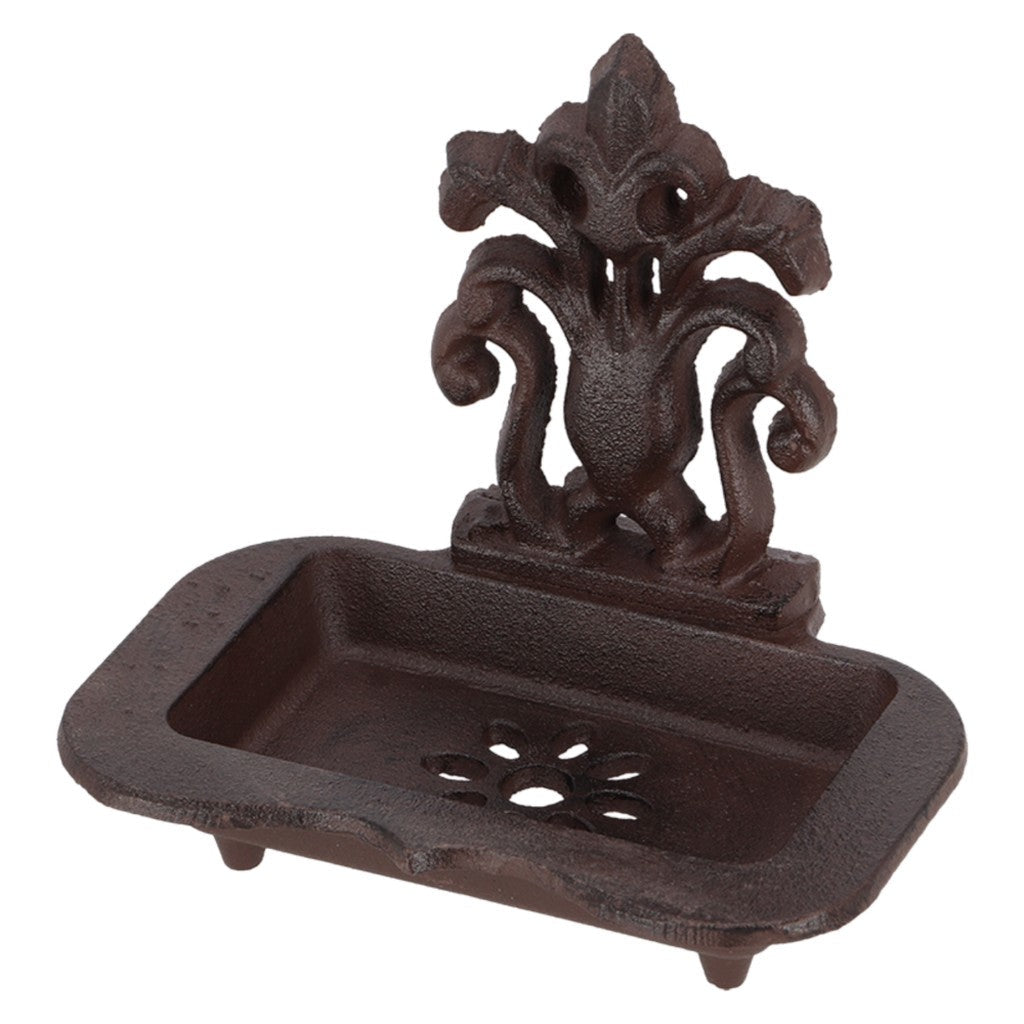 Ornate cast iron soap dish on white