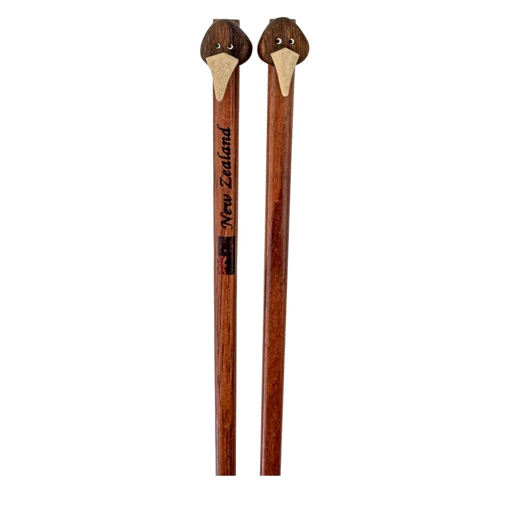 Pair of kiwi topped wooden chopsticks