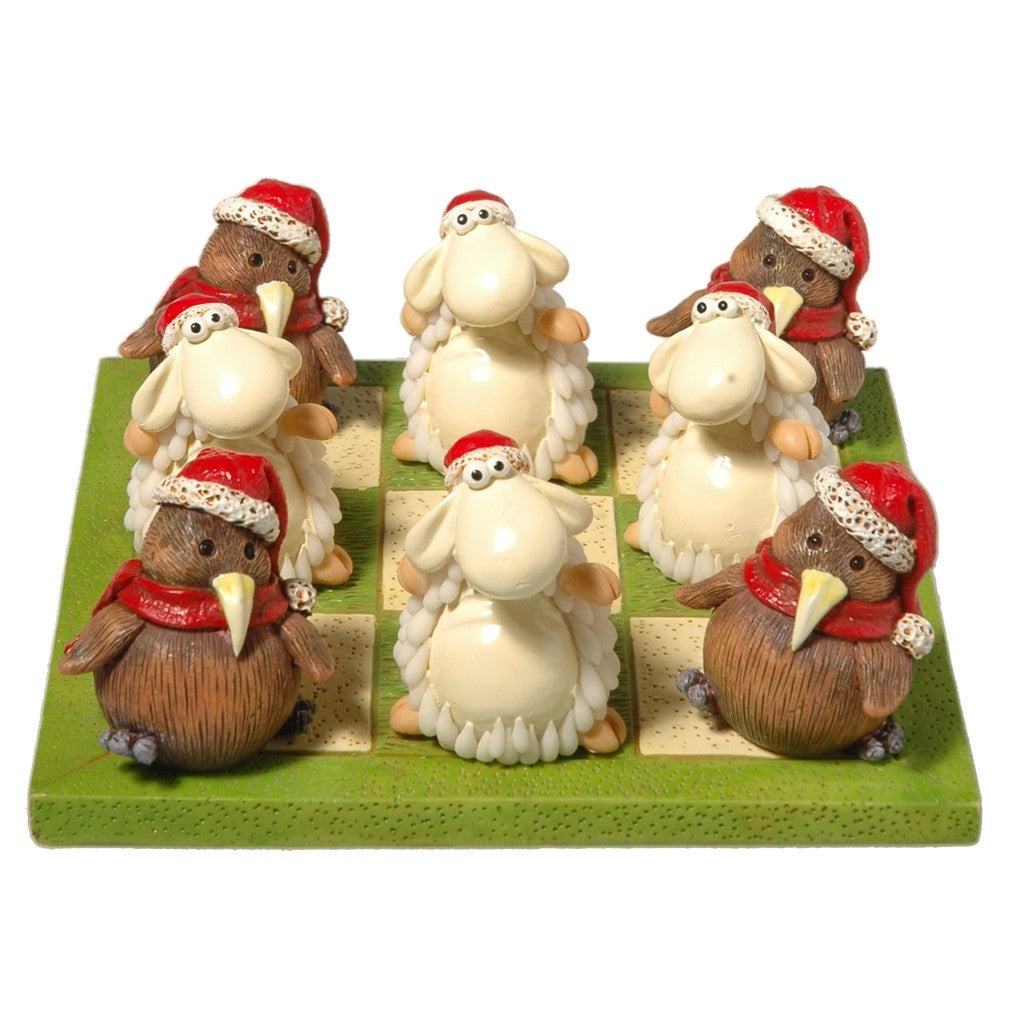 Christmas tic tac toe board with kiwi and sheep pieces in Santa hats