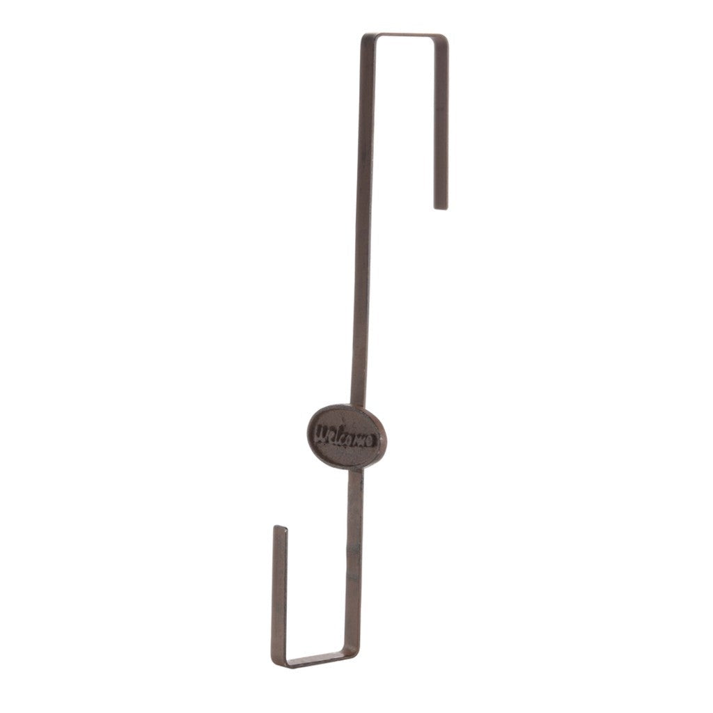 Metal over-the-door wreath hanger on white