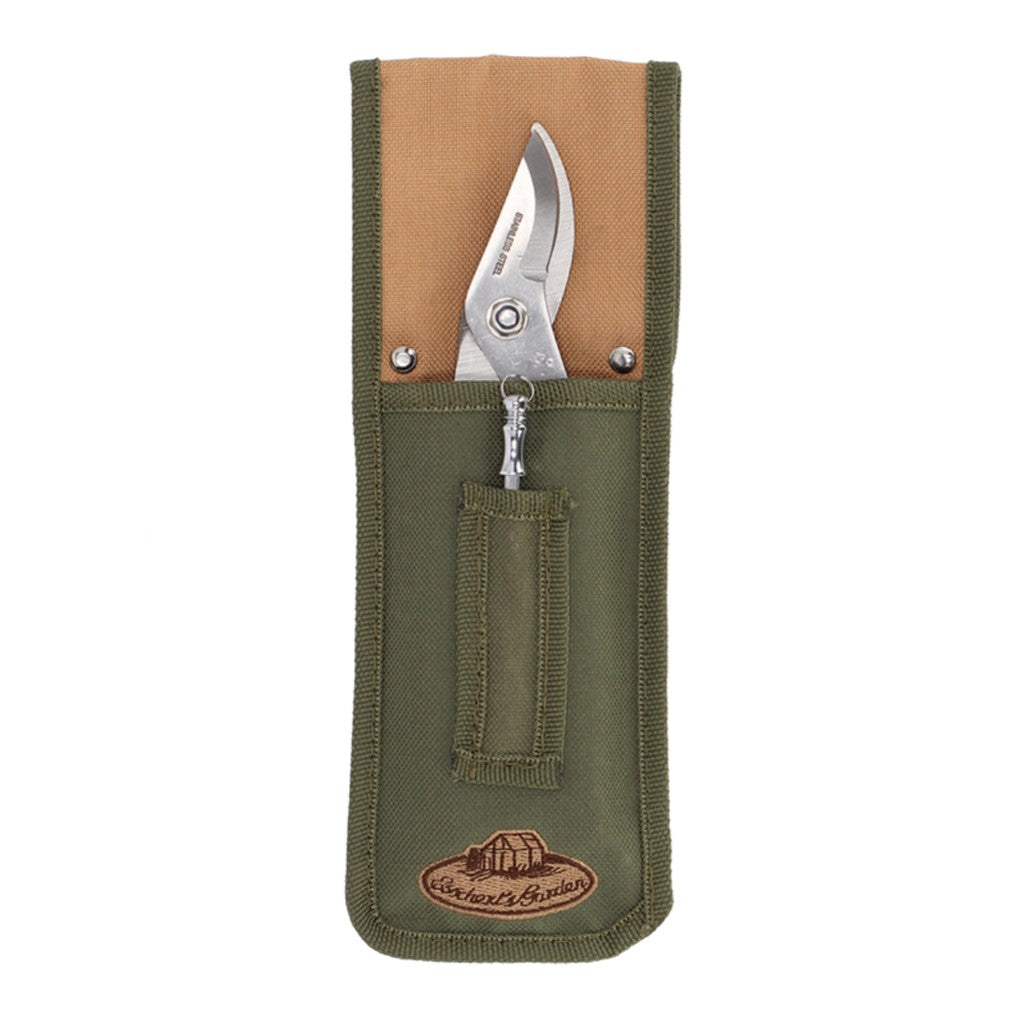 Pruner stored in its canvas belt pouch