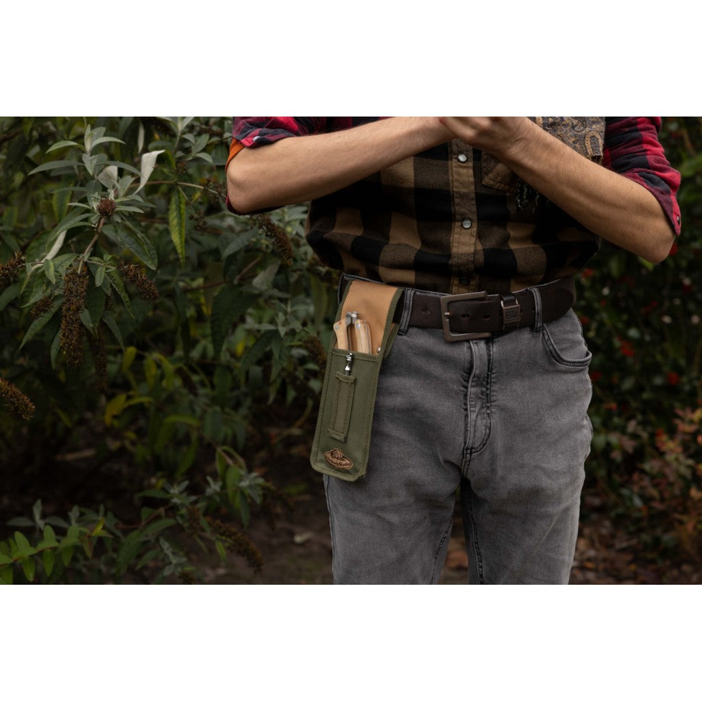 Pruner pouch worn on a gardener's belt