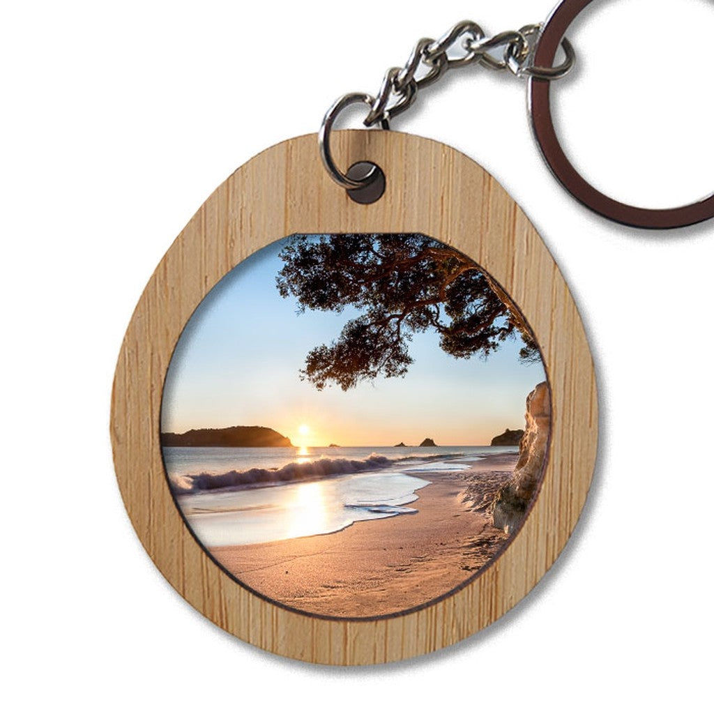 Pikitia bamboo key ring with a Hahei Beach sunrise photo