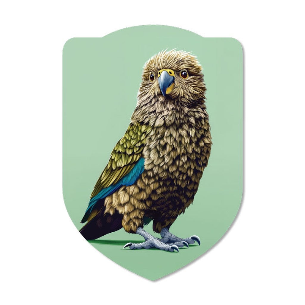 Pikitia kea sticker on a sage green badge