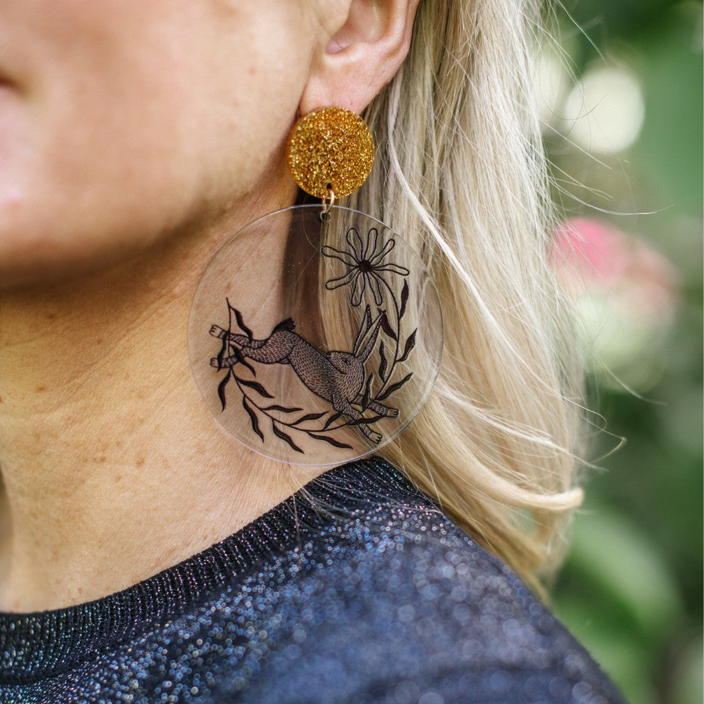 Studio Soph Blue Disk earring, close-up worn