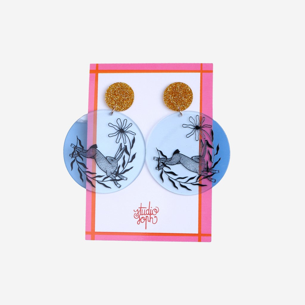 Studio Soph Blue Disk earrings on their backing card
