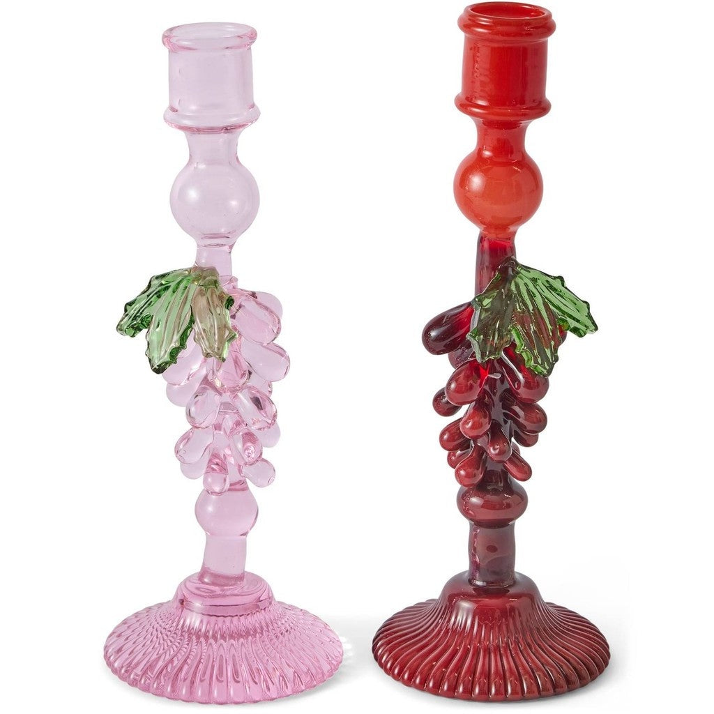 Kip & Co Under The Vine candlestick holders, one pink and one red, with grape details